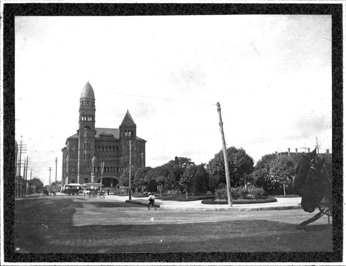 Bexar County courthouse with trees in the foreground